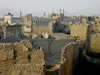 Destruction with Mosque in Background